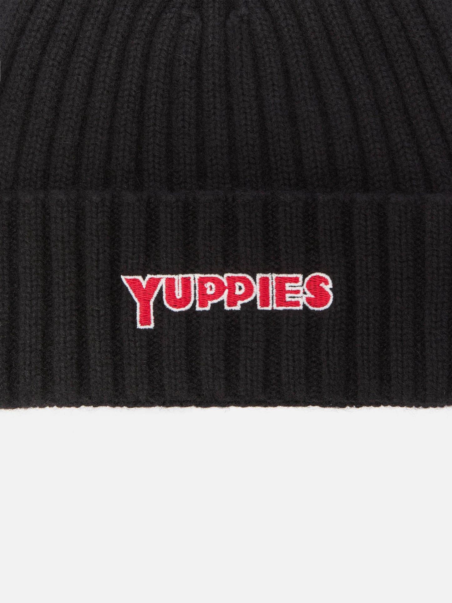 Wengen beanie in cashmere blend in black with Yuppies embroidery