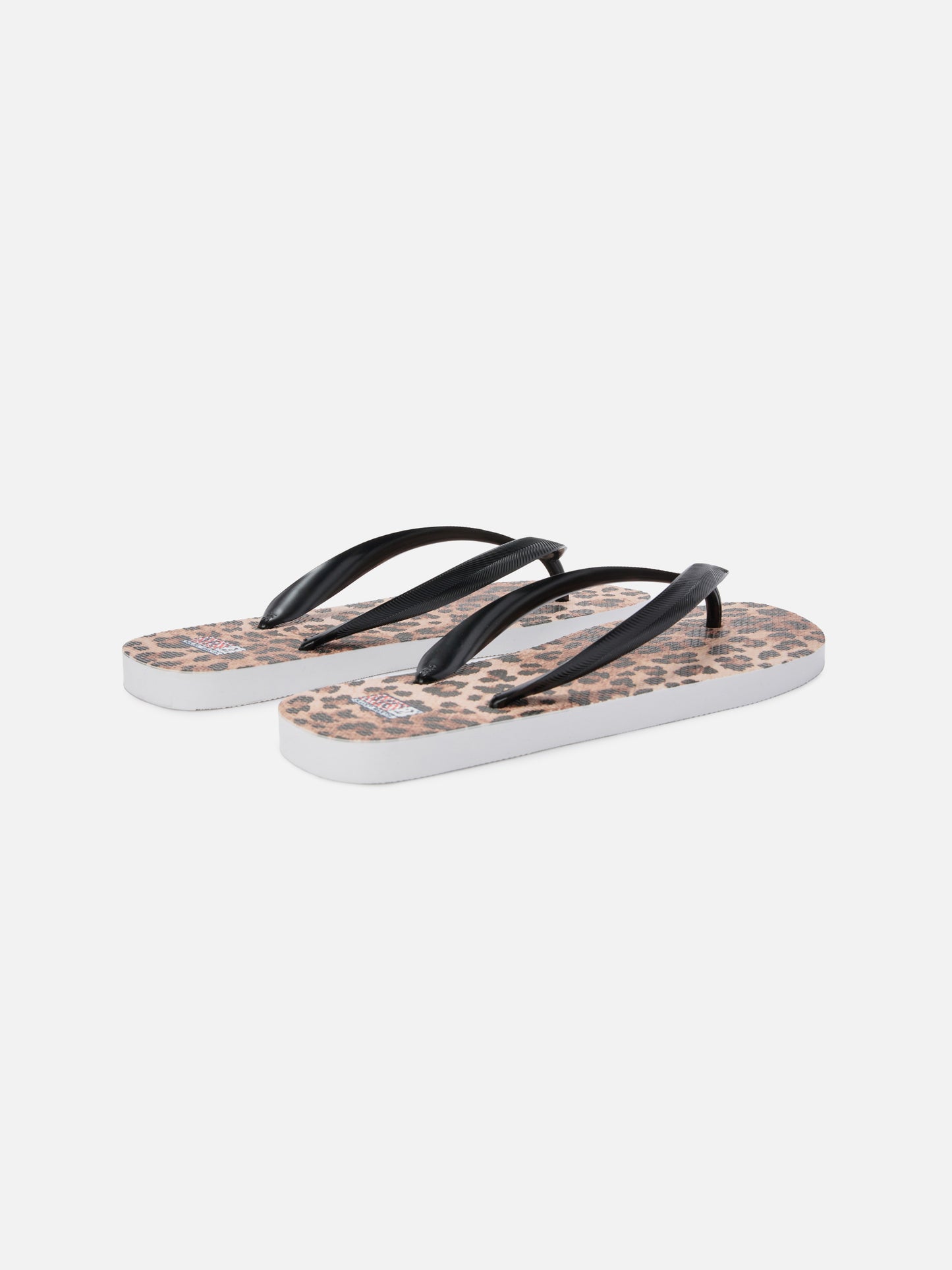 Alma rubber slip-on flip flops with leopard print