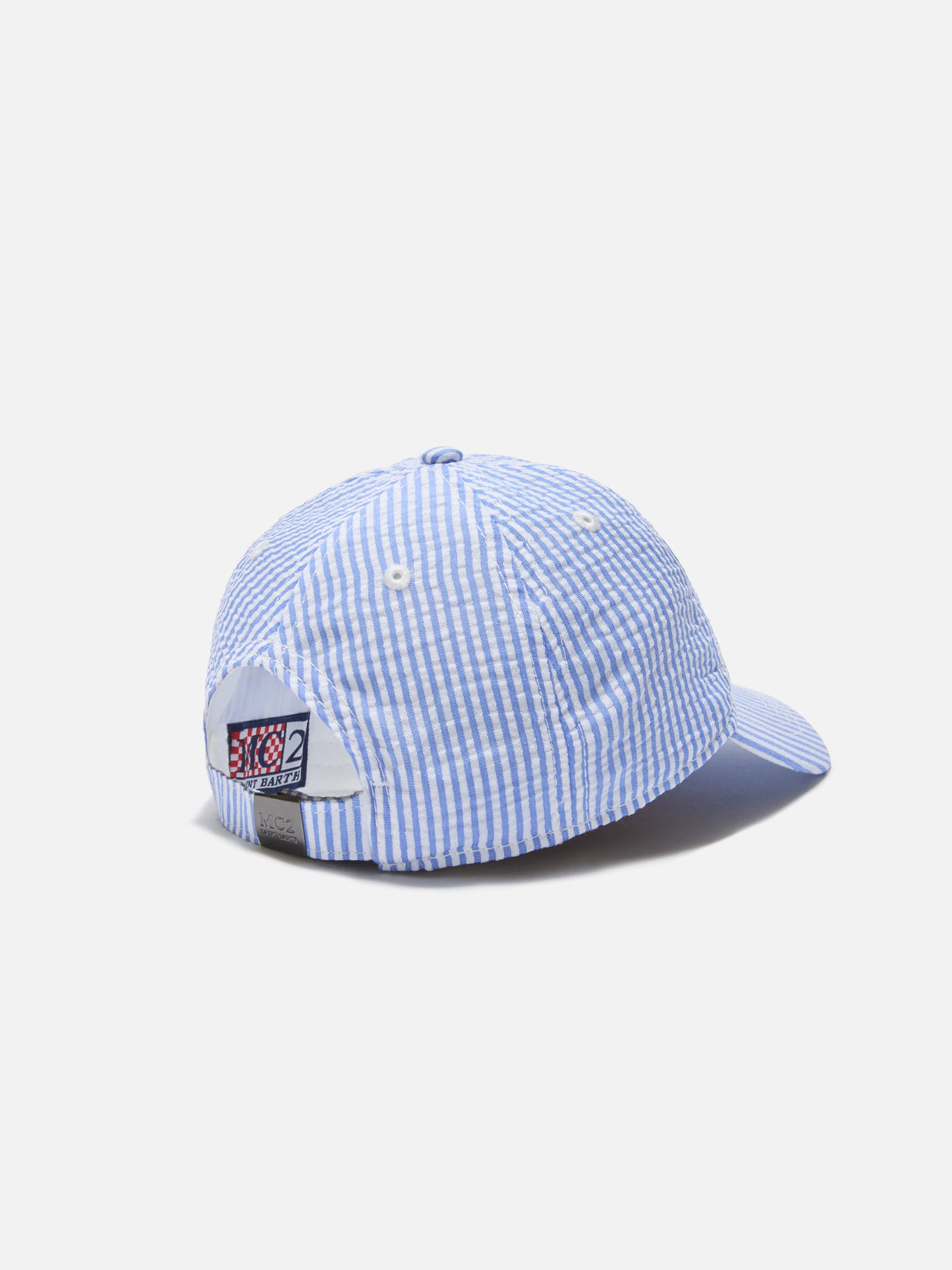 Baseball cap with visor in cotton seersucker with light blue and white stripes