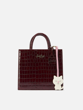Cat-shaped smooth leather bag charm with logo tag