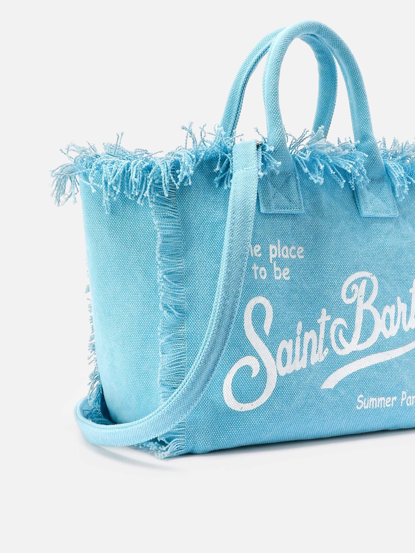 Light blue canvas Colette bag with fringes