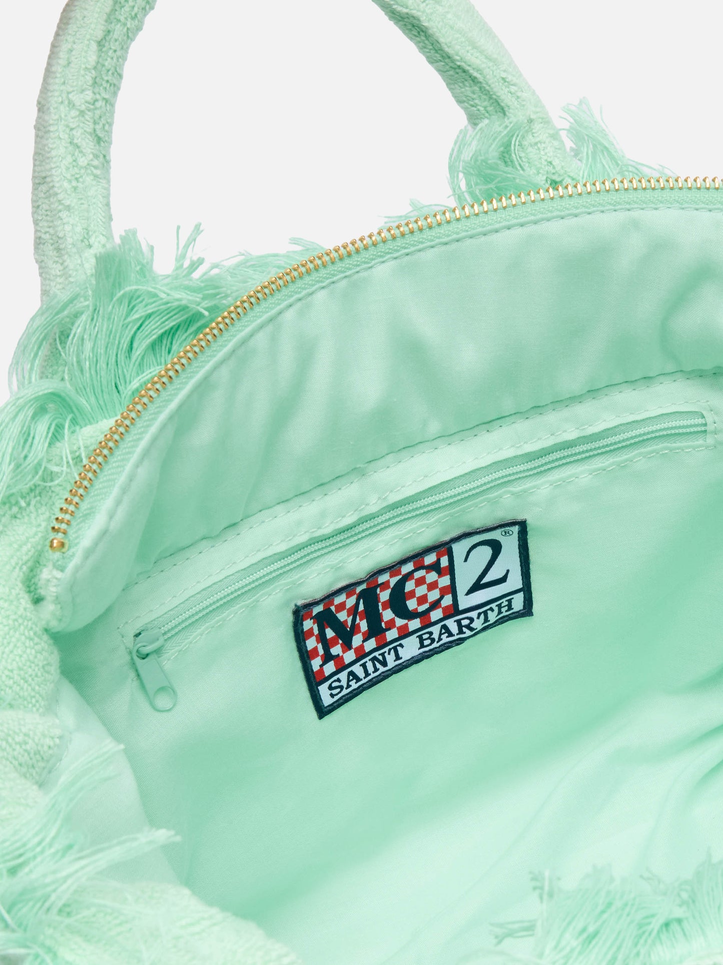 Colette Terry embossed mint green handbag