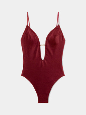 Crunchy one-piece swimsuit in burgundy glossy finish with charms