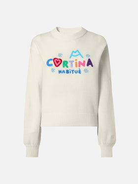 White crewneck Danya with Cortina Habitué patch