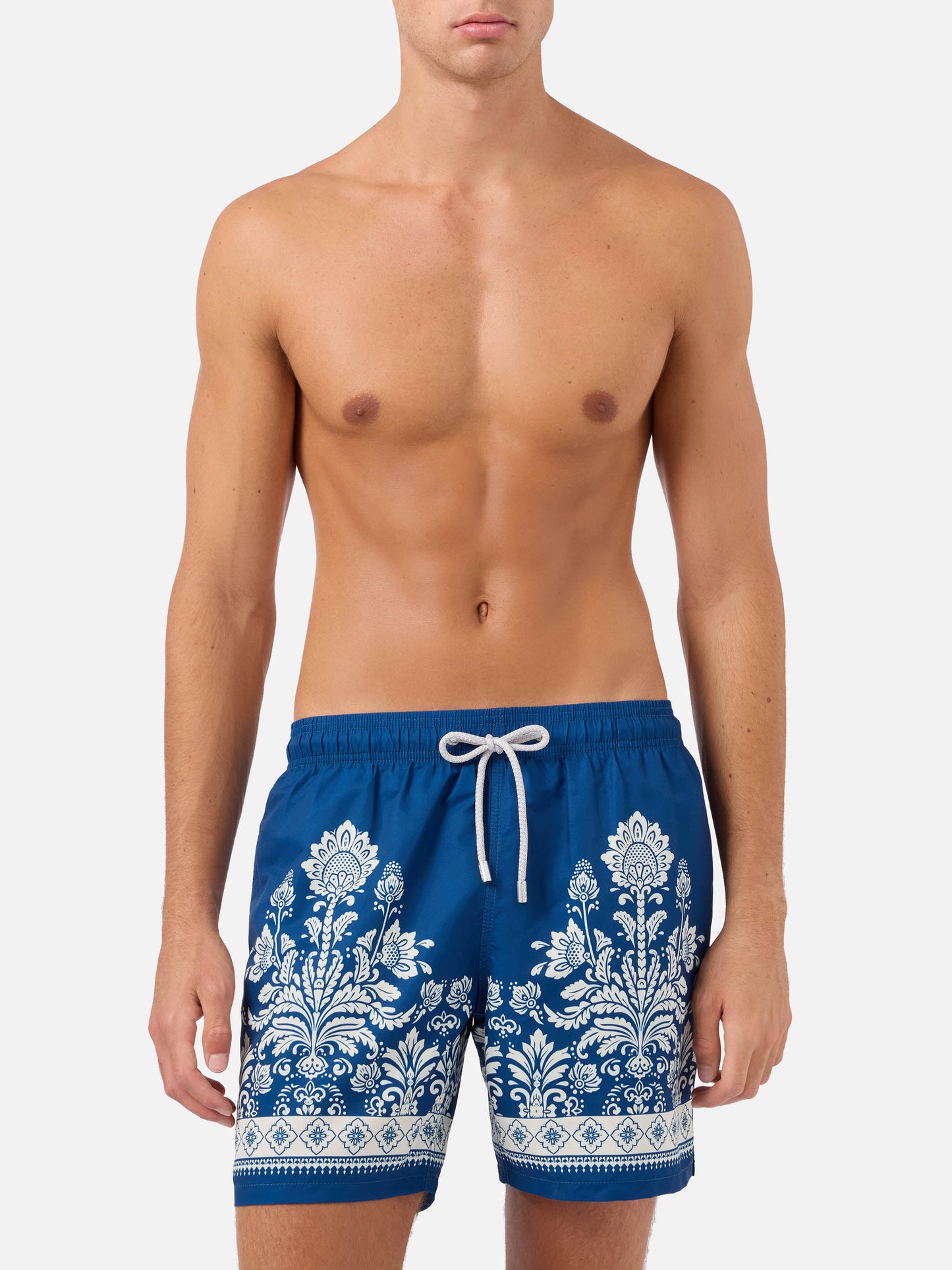 Gustavia blue swim shorts with ornamental floral print
