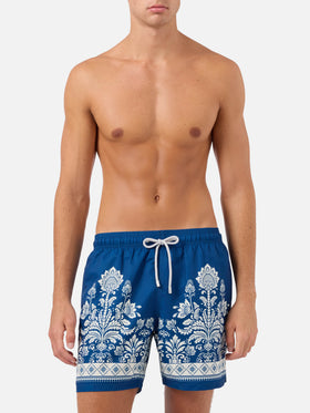 Gustavia blue swim shorts with ornamental floral print