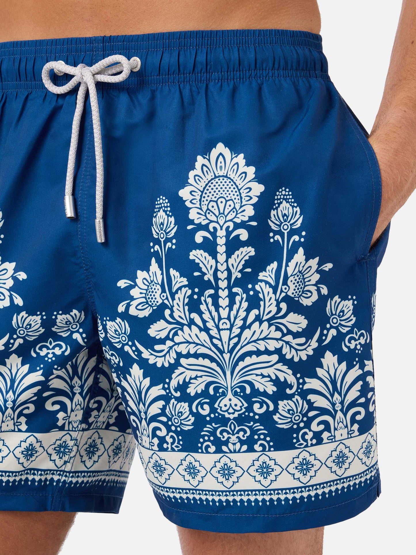 Gustavia blue swim shorts with ornamental floral print