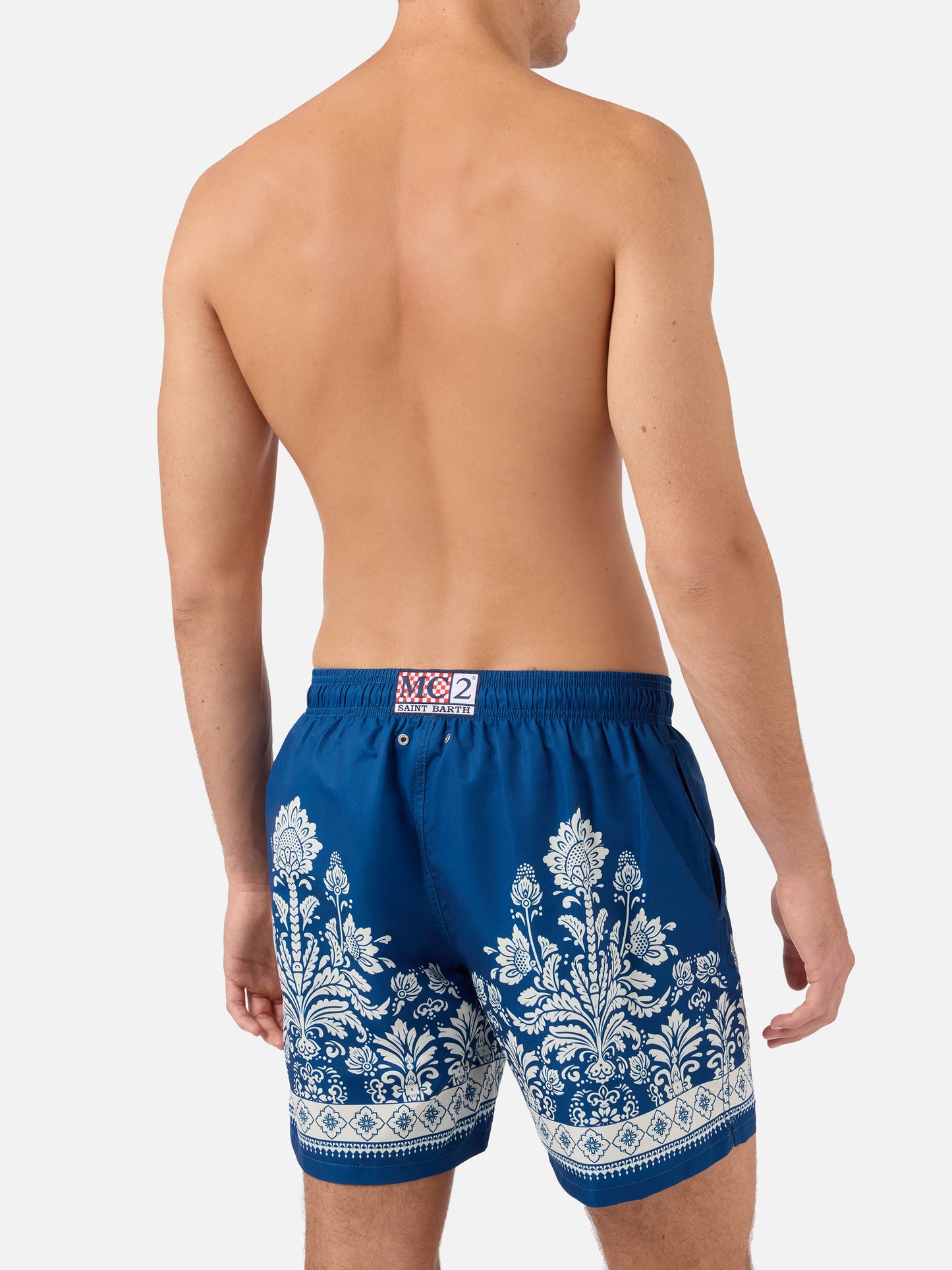 Gustavia blue swim shorts with ornamental floral print