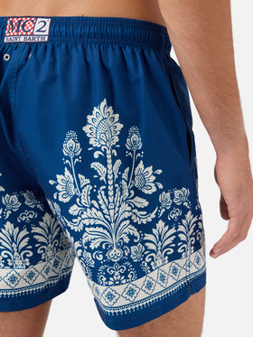 Gustavia blue swim shorts with ornamental floral print