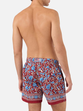 Gustavia burgundy swim shorts with floral print