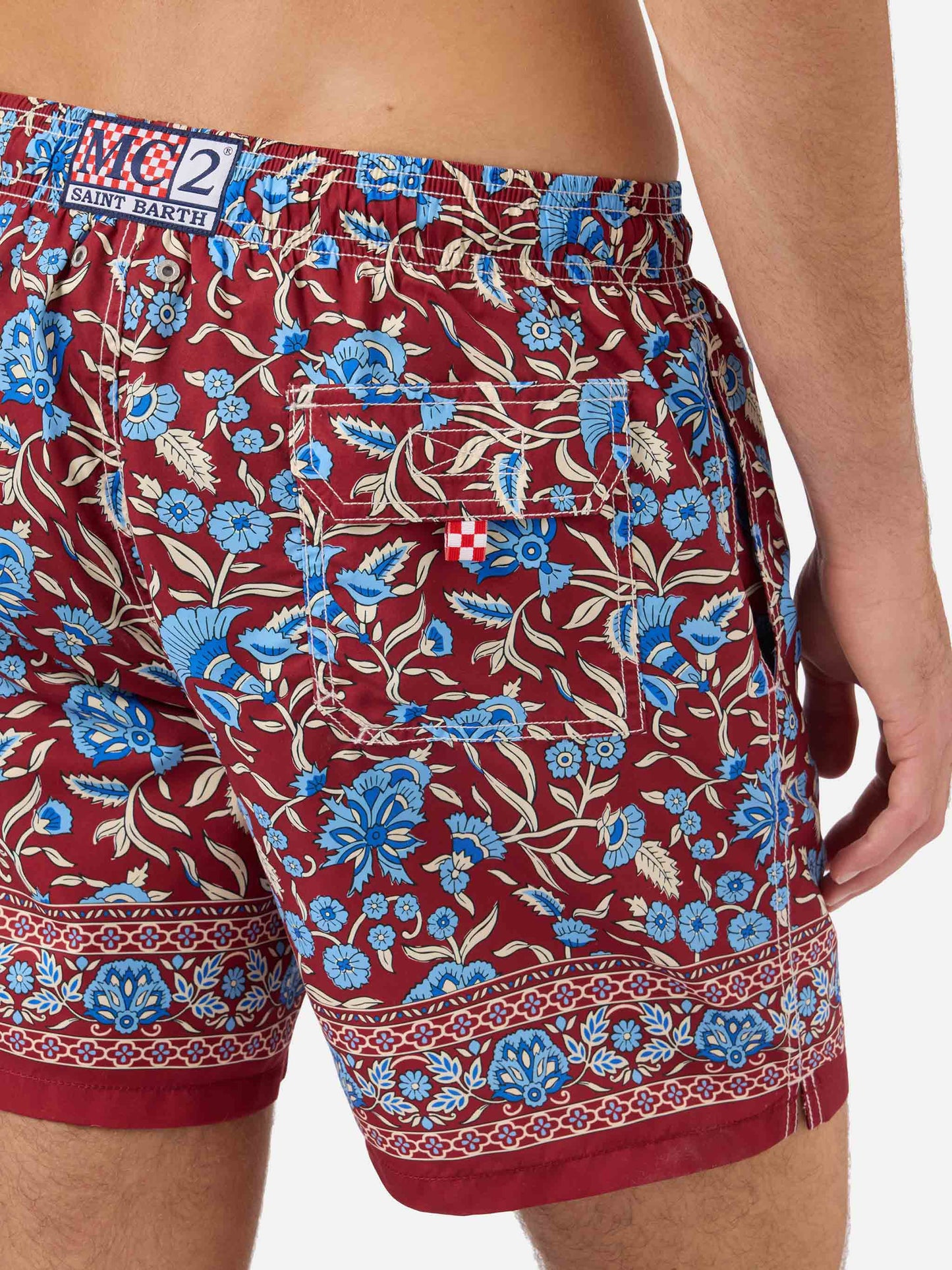 Gustavia burgundy swim shorts with floral print