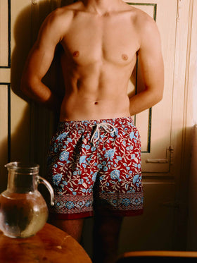 Gustavia bordeauxfarbene Badeshorts mit floralem Print 
