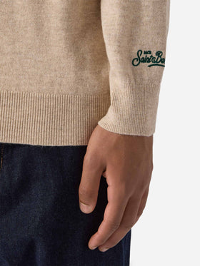 Rundhalspullover „Heron Light“ mit gestickter Uhr „Time has no price“.