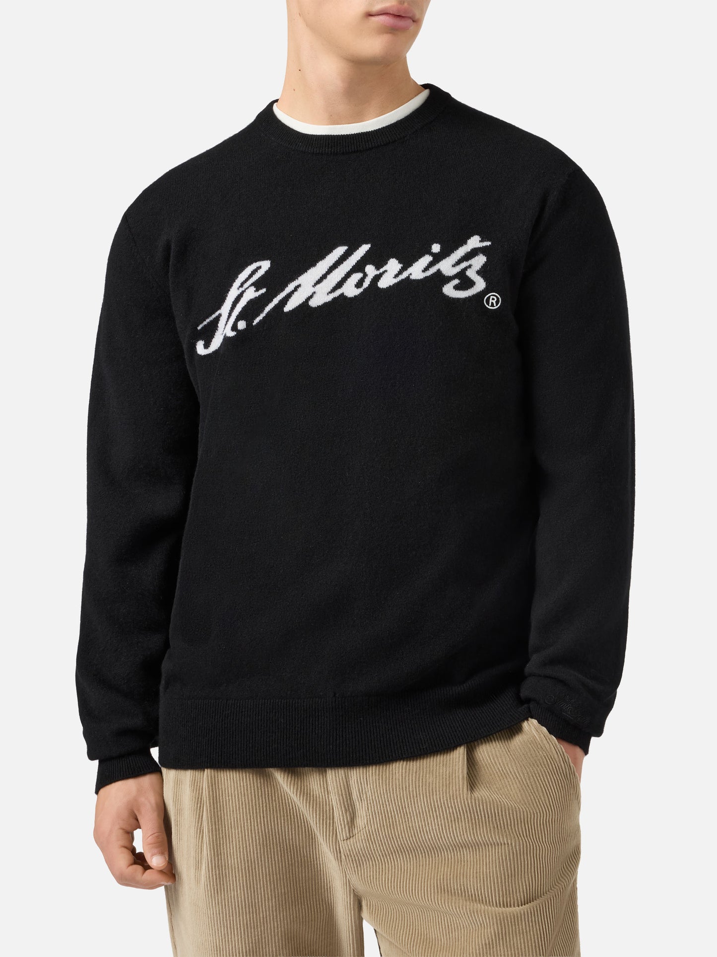 Heron Light Pullover aus 100 % schwarzem Kaschmir mit St. Moritz Intarsien | ST. MORITZ TOP OF THE WORLD