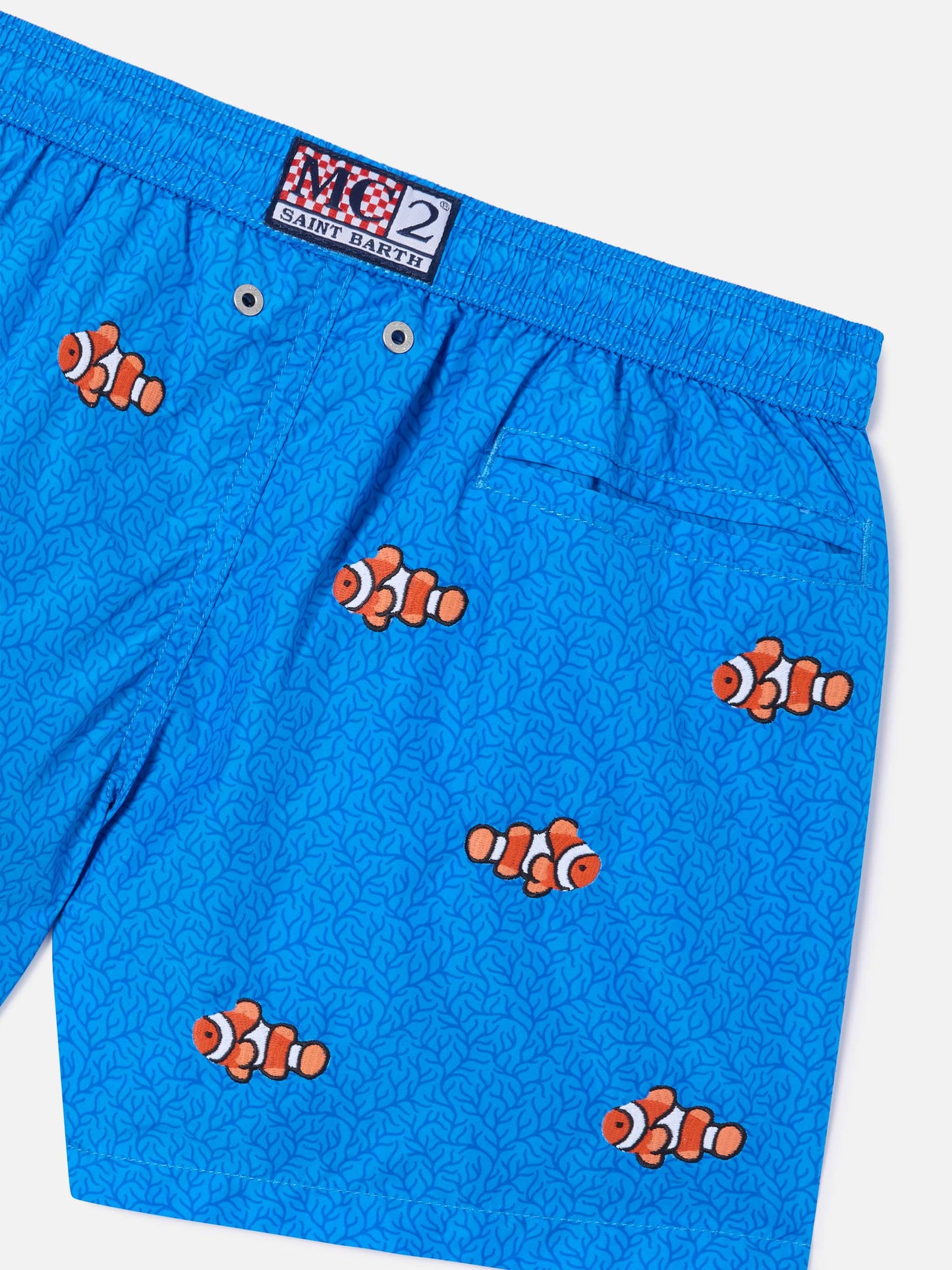 Jean Embroidery swim shorts with Clownfish on coral background