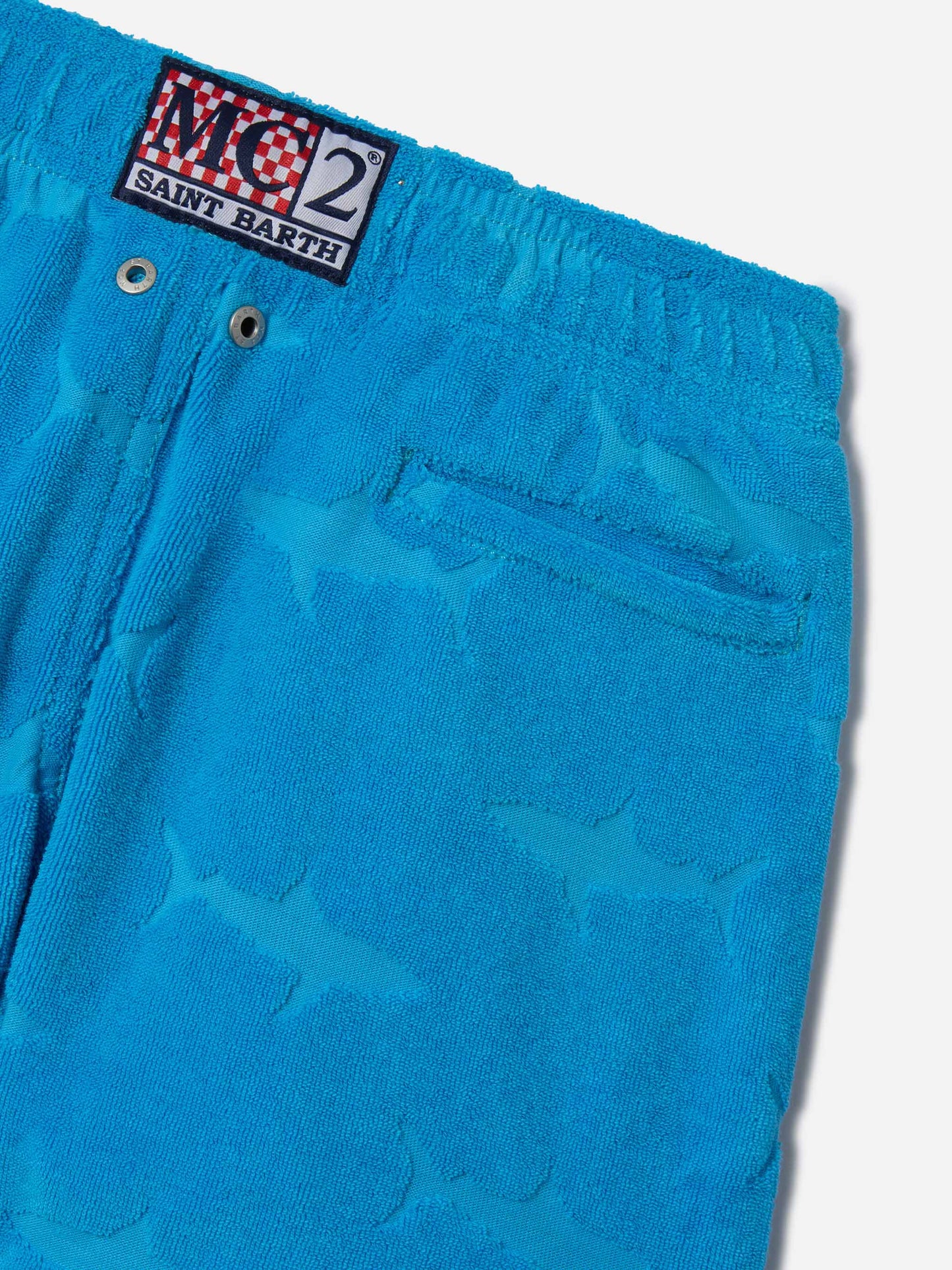 Badeshorts für Jungen mit geprägten Haien aus Frottee 