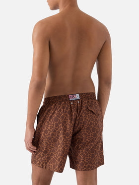 Brown Lighting swim shorts with all-over animal print