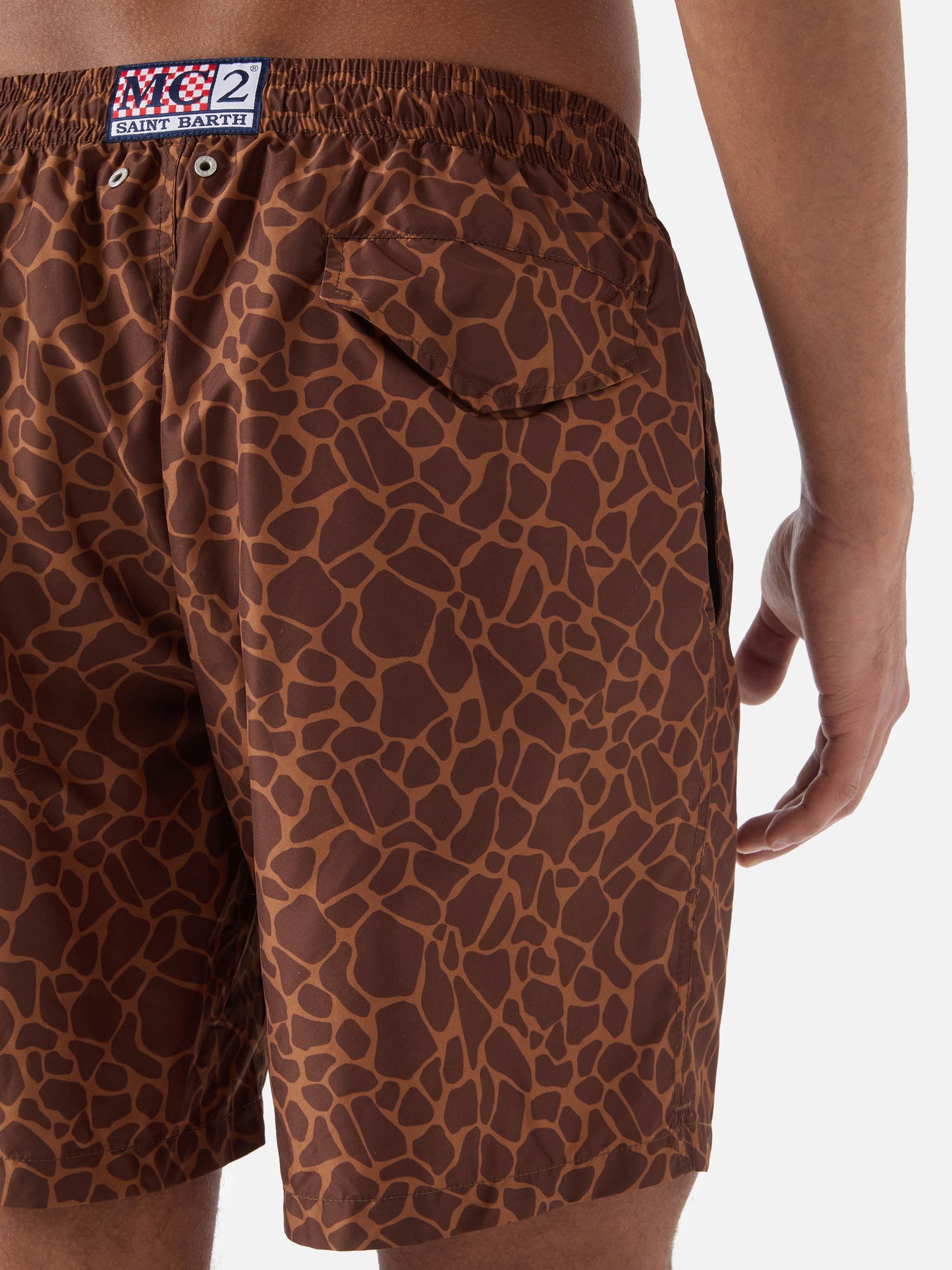 Brown Lighting swim shorts with all-over animal print