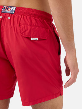 Lighting Pantone swim shorts in red | PANTONE SPECIAL EDITION