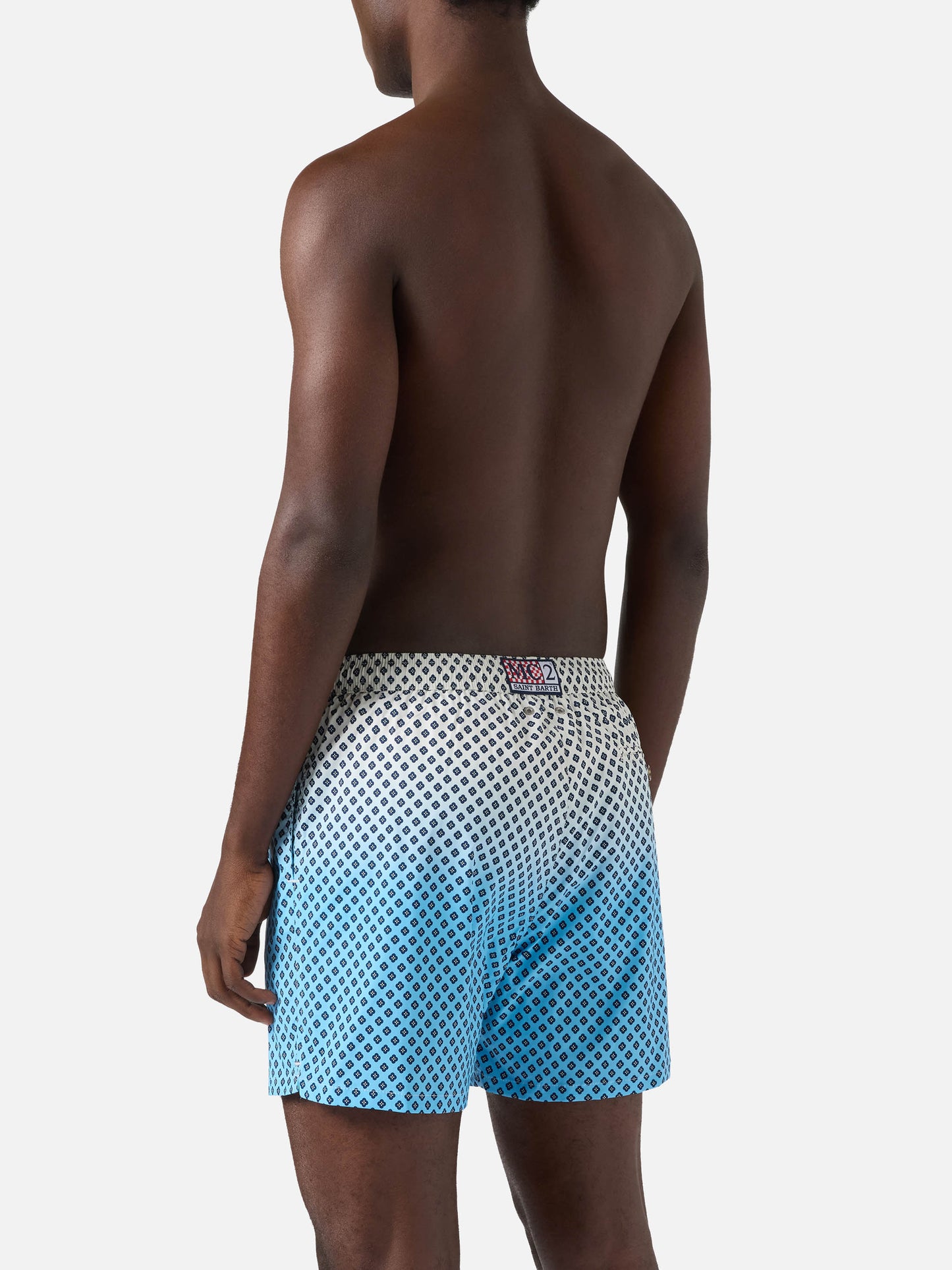Lighting Micro swim shorts with geometric print on shaded background