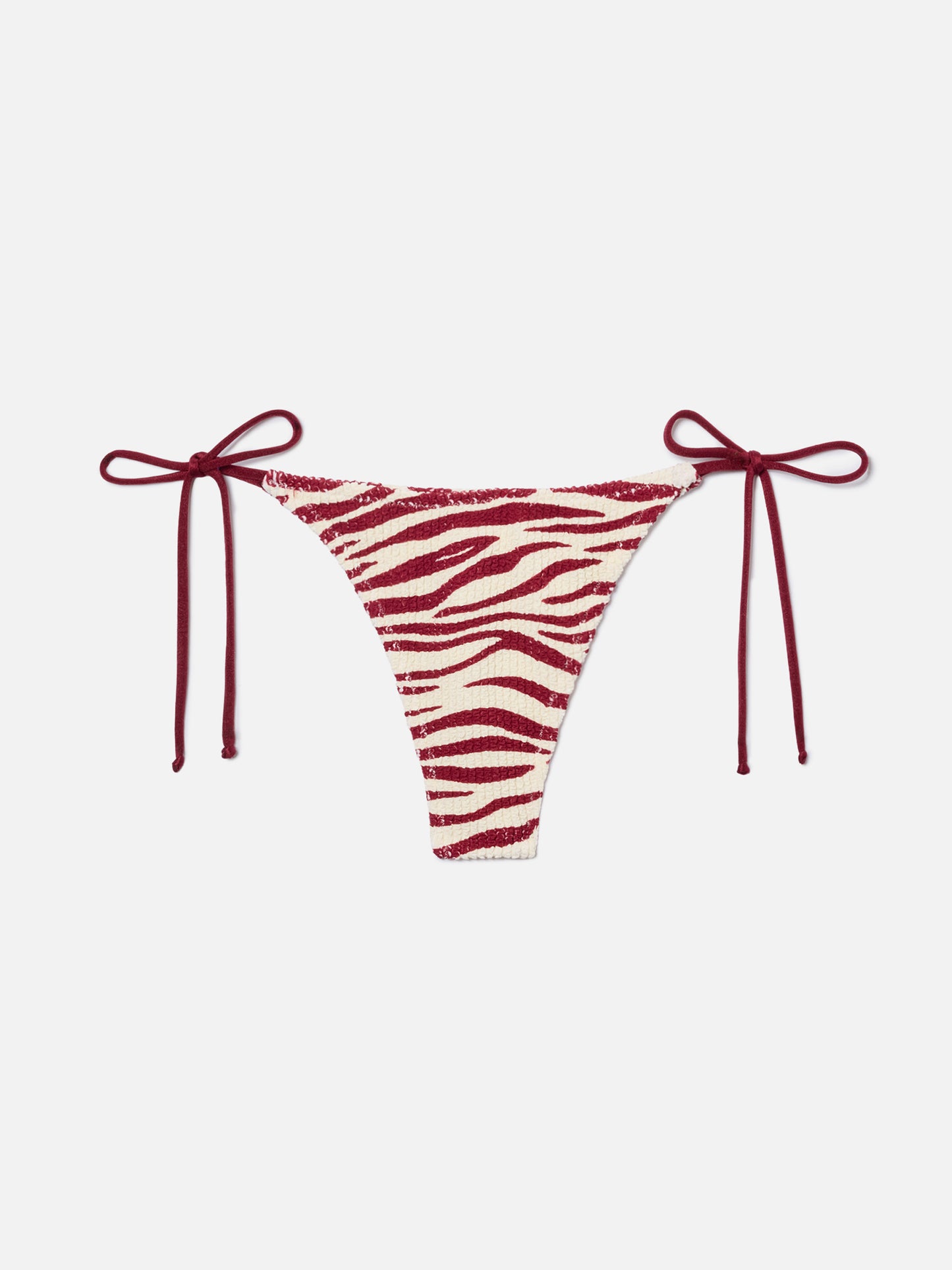 Braguita de bikini thong Norah en tejido crinkle con estampado de cebra 