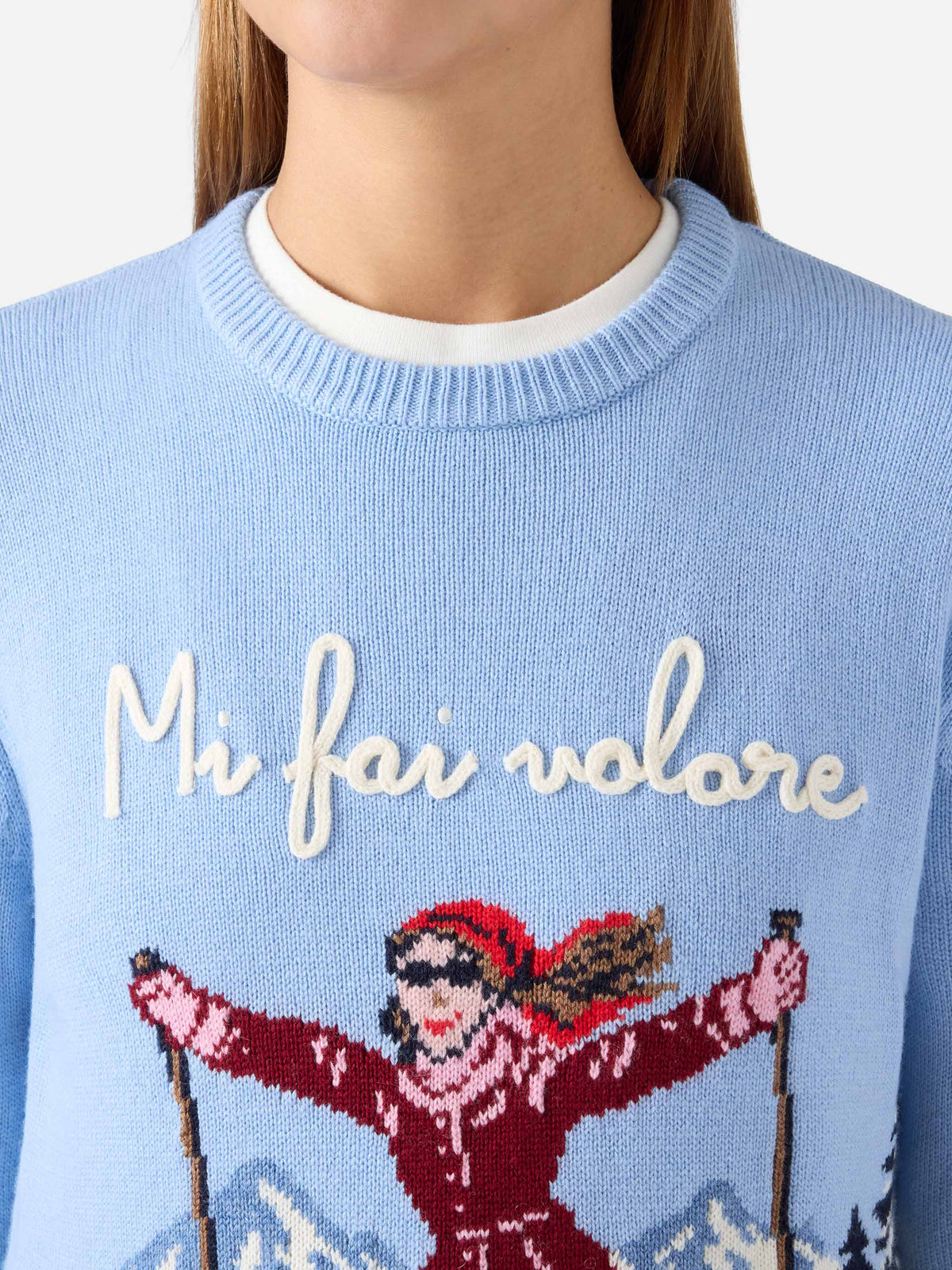 Light blue New Queen crewneck knit with Mi Fai Volare embroidery