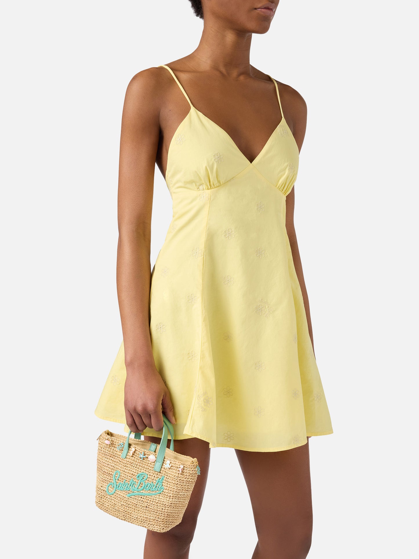 City mini raffia bag with applied charms and embroidered logo