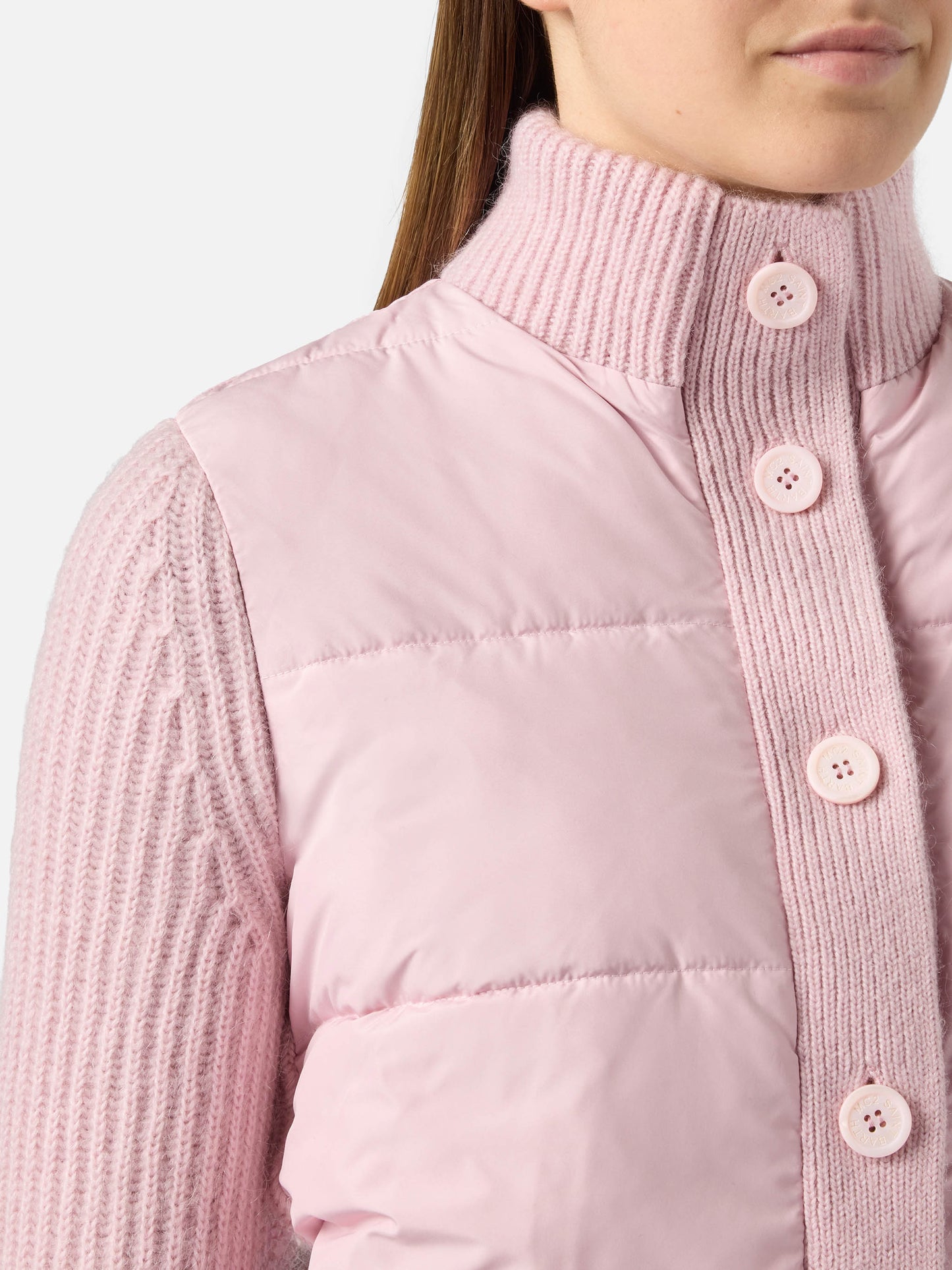Woman  padded jacket with knitted sleeves