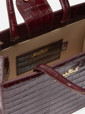 Shop Bag Midi Handbag in burgundy crocodile-print leather