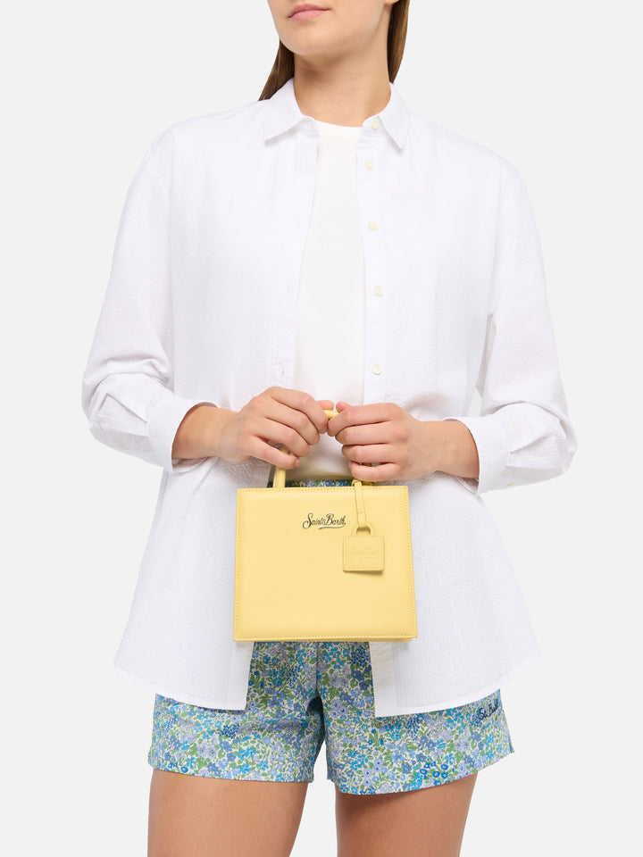 Structured Shop mini bag in butter yellow smooth leather with metal tag