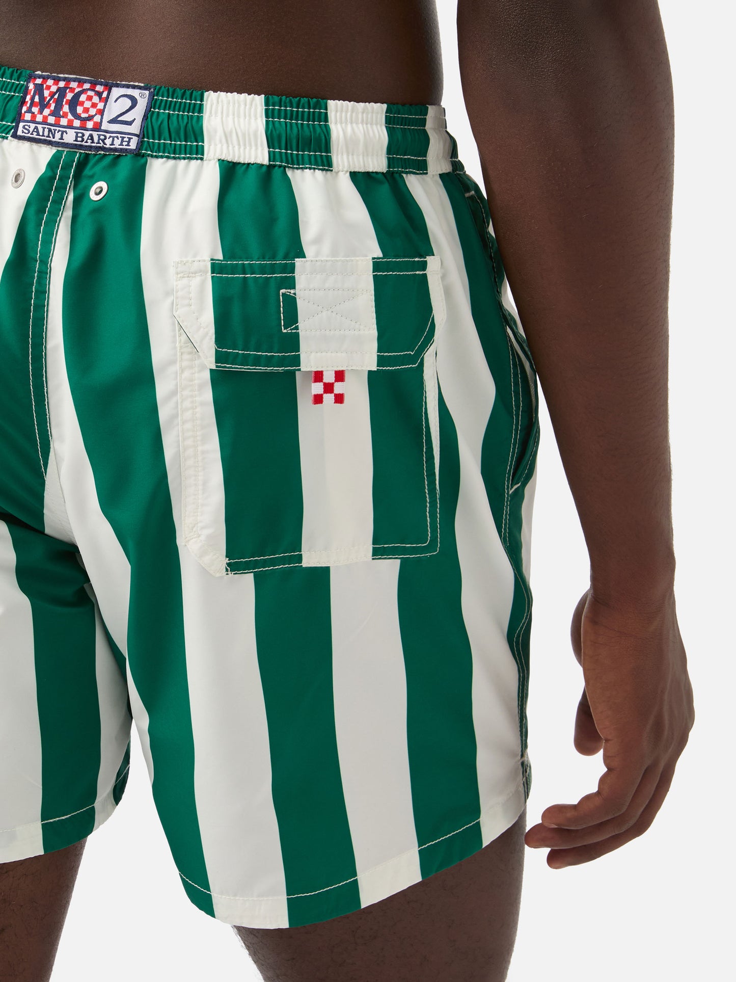 Syros swim shorts with white and British green striped print