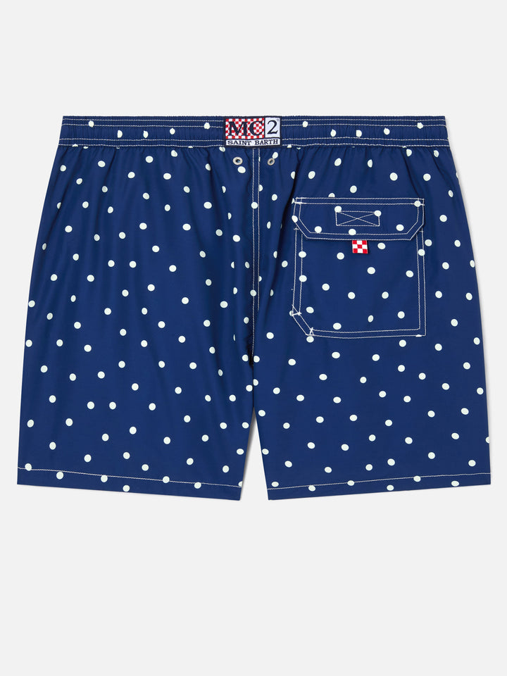 Syros swim shorts in blue with polka dot embroidery