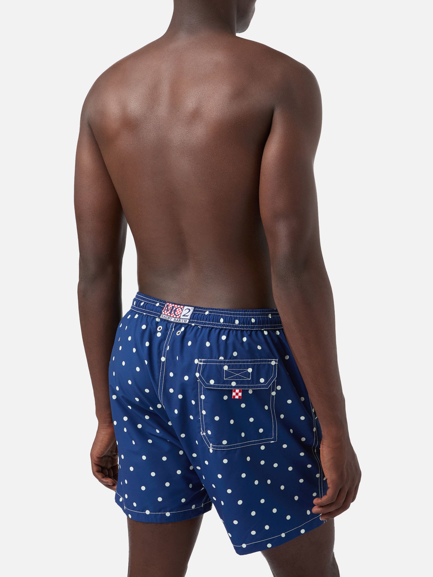 Syros swim shorts in blue with polka dot embroidery