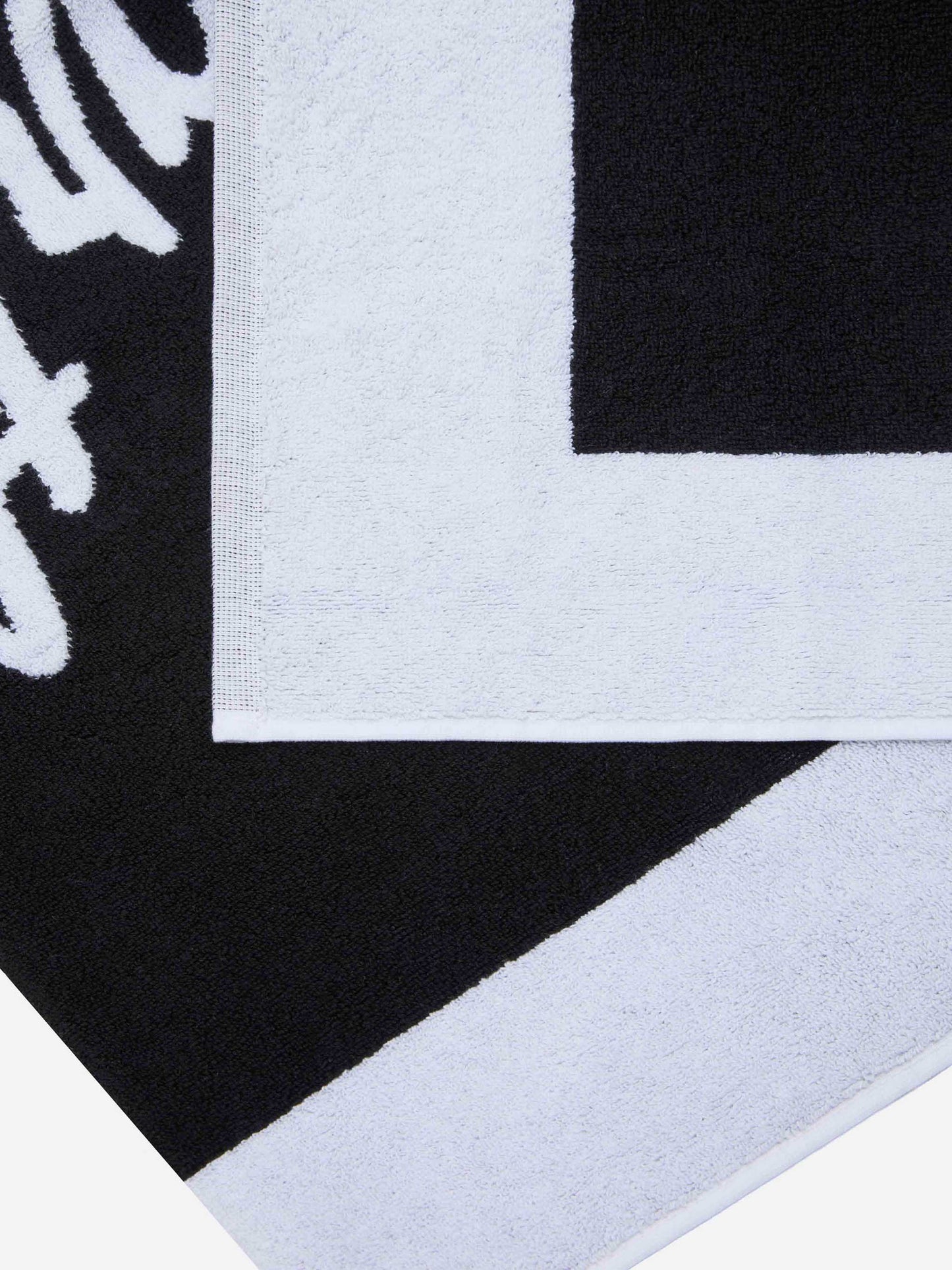 Telo mare nero in spugna con bordo bianco