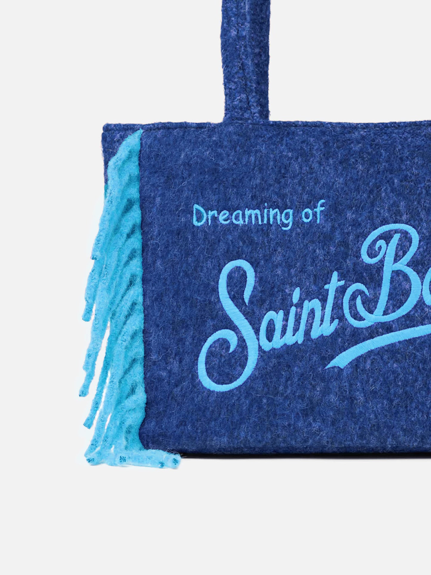 Vanity blanket shoulder bag with side fringes