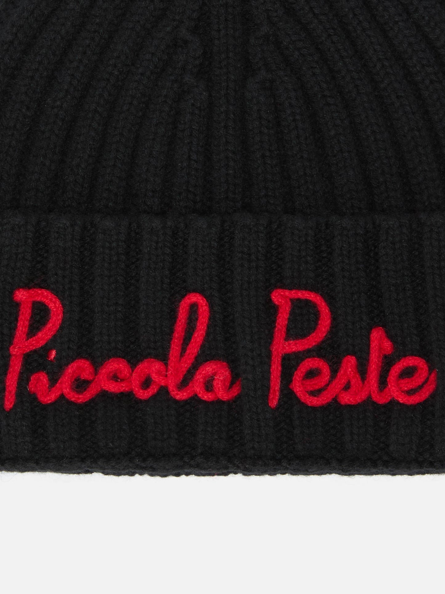 Wengen Jr beanie in cashmere blend in black with Piccola Peste embroidery