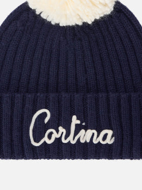 Berretto Wengen blu navy con pompon e ricamo Cortina