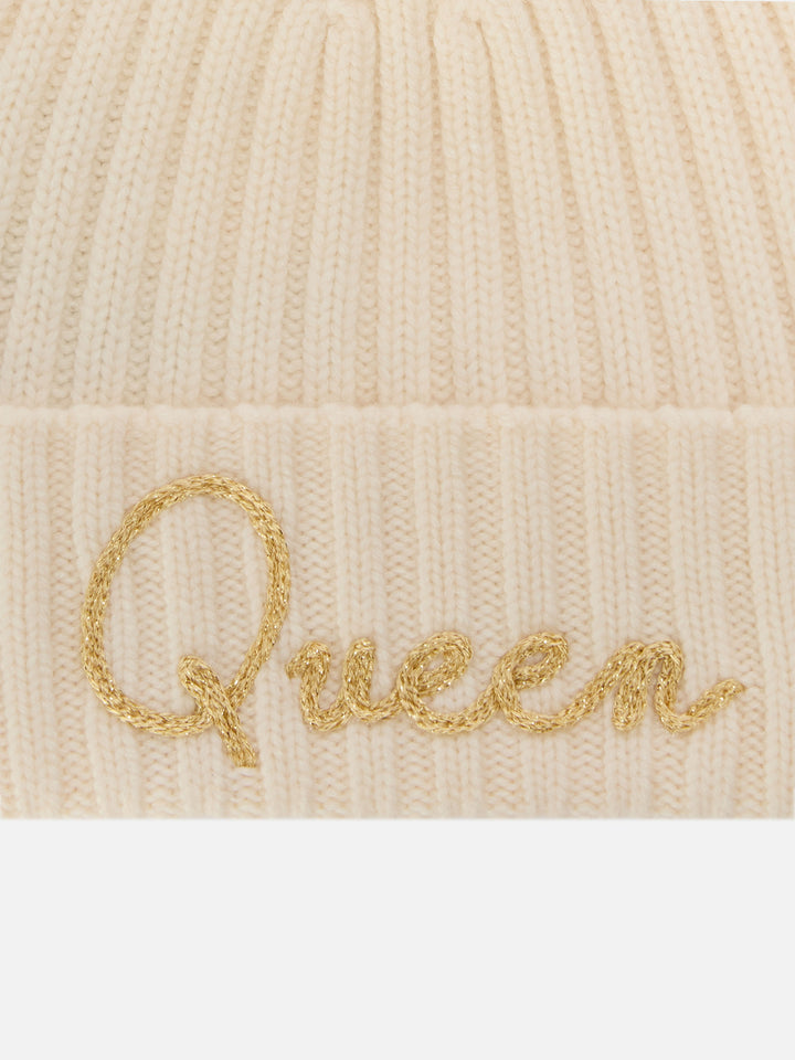 Berretto Wengen panna con pompon e ricamo Queen
